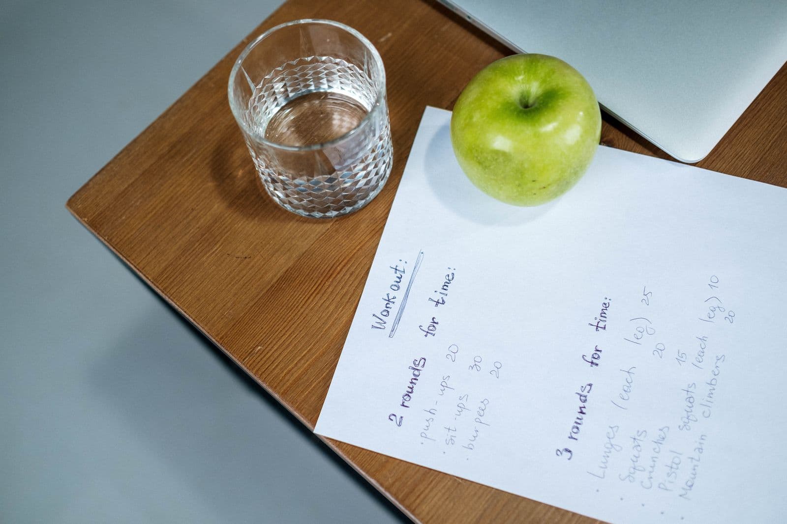A training plan being written out at a desk
